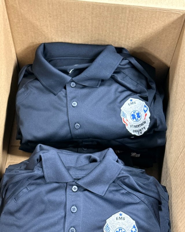Embroidered EMS polos ready for pickup